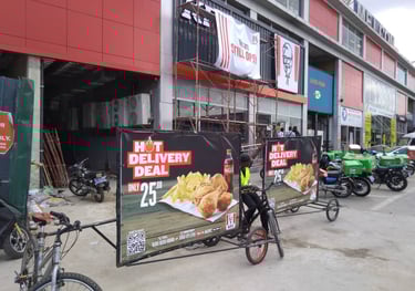 bicycle street advert by bensyl ghana for KFC ghana