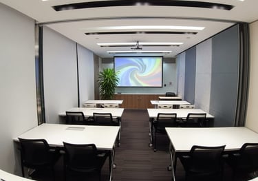 a conference room with a projector screen and a projector in Kwun Tong Hong Kong to rent by hour