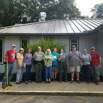 A group of FOPM volunteers after a work-day.