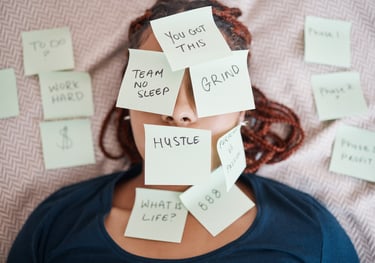 a woman with sticky notes on her face