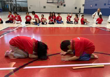 kids bowing to each other in calgary aikido class