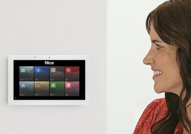 Smart home automation touchscreen controlling lighting and climate in Cambridgeshire