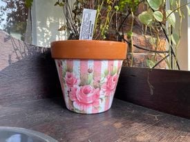 Napkins decoupaged on Terracotta