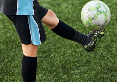 Outdoor sports gear arranged on ground