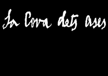White handwritten text reading Sa Cova dets Ases, in a rustic script over a solid black background.