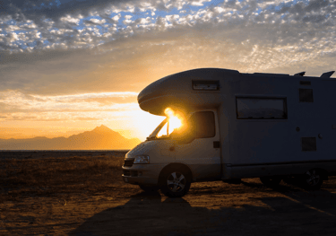 a camper van parked in the desert