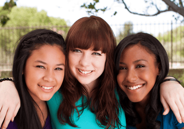 Group of teen girls smiling