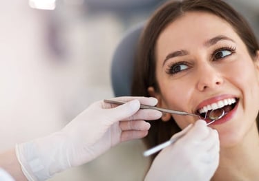beautiful women getting dental treatment  in white castle dental clinic katraj pune