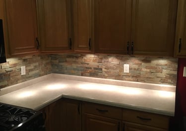 Annick Building Services a Custom kitchen counter top with a stove top