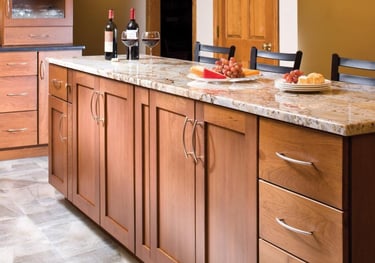 Modern wood kitchen cabinets with solid granite countertops. Kitchen cabinets and flooring.