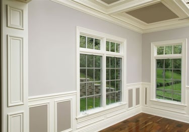 Millwork and windows, elegant baseboards and beautiful crown molding. Vinyl plank flooring installer