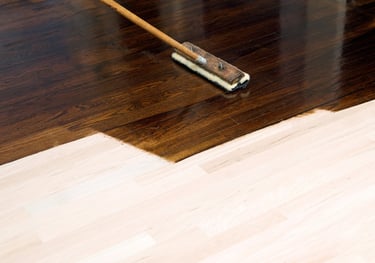 Dark brown wood stain on hardwood floors. Wood floor maintenance. Staining wood floors Everett.