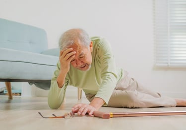 physiotherapy at home for seniors - an elderly man is upset on the floor after a fall