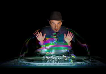 a man with a hat and a hat on a table