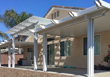 Split levele patio cover with raised center in white.