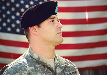 veteran looking eastward with the us flag as a backdrop
