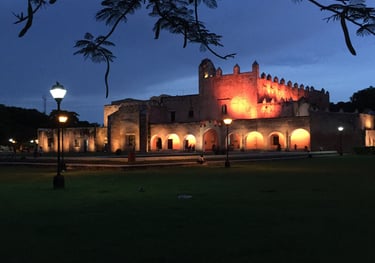 a castle like building with a clock tower in the background