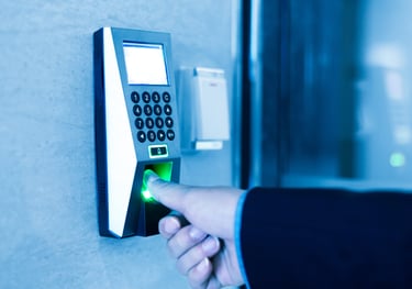 a person is pressing a button on a door