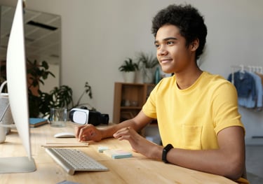 a student happily engaged in an online physics class