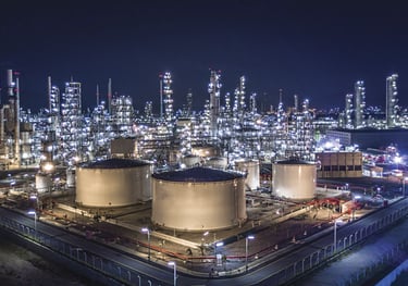 a large industrial oil refinery with a lot of tanks