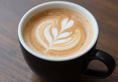 Close-up of a steaming cup of freshly brewed coffee on a rustic wooden table.