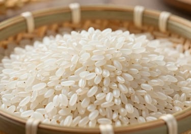 White glutinous rice grains presented in a traditional woven bamboo basket, soft natural daylight, rustic yet professional agricultural setting.