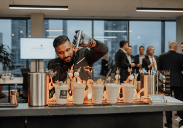 Professional bartender uses a blowtorch to create flaming cocktails at a corporate event bar.