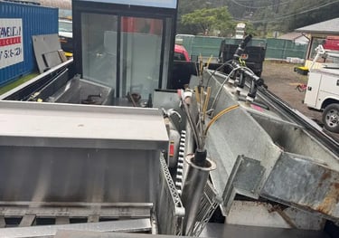 trailer full of aplliances and metal