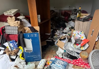 garage full of trash and furniture