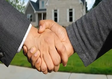 Buisness partners shaking hands for a real estate joint venture project