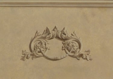 Ornementation, moulures et fausse pierre peintes dans cette grisaille en trompe-l'oeil