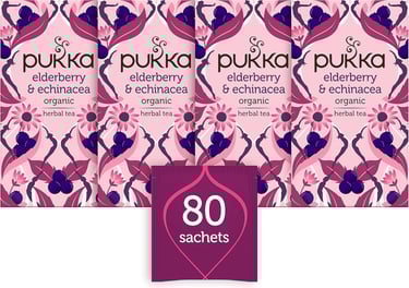 a bunch of pink tea bags with a pink flower