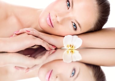 woman with orchid and mirror refelection