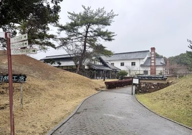 Visitors creating and painting Arita pottery in a workshop