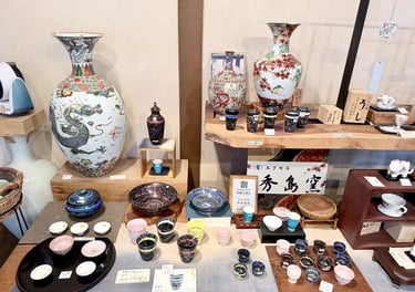 Traditional Arita porcelain with blue and white designs on display