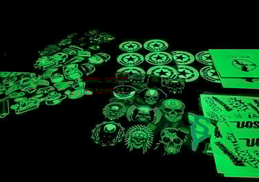 a table with a lot of different items in the dark