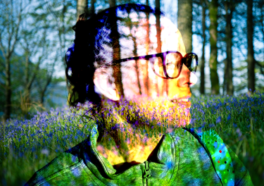 a womans face woodland shining thru her face