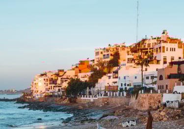 a beach with a boat in the water