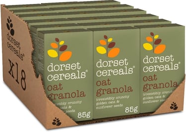 Bulk 18 pack of Dorset Cereals Oat Granola 85g boxes with golden oats and sunflower seeds.
