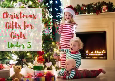 two children in pajamass with santa claus hats