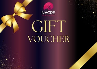 a gift vouchert with a gold ribbon and a bow