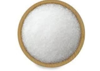 Hand-carved pink salt tealight holder creating a soothing, ambient candlelight effect