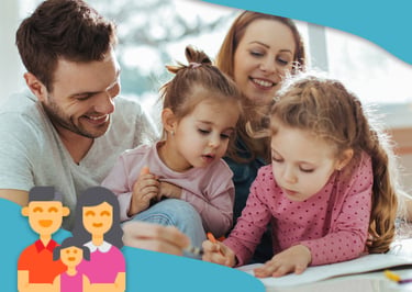 A happy family with two young daughters drawing and coloring together at home.