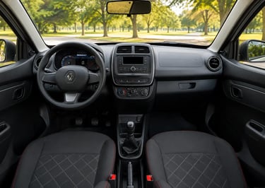 Interior do Renault Kwid com painel, câmbio manual e bancos dianteiros
