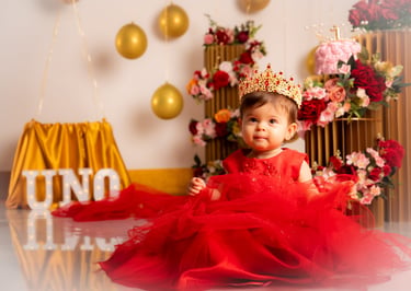 a baby girl wearing a tiablet and a tiable