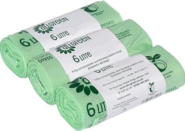 a roll of green cleaning cloth with a roll of green leaves