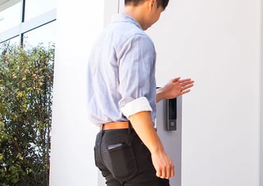 Person using a secure video intercom system to enter a business office in Las Vegas