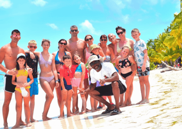 Group of guests on Saona Island beach with Pac Tour Excursions Bayahibe