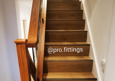 Laminate flooring fitted on stairs in Tottenham. 