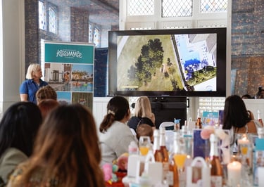 people looking at the tv during an event